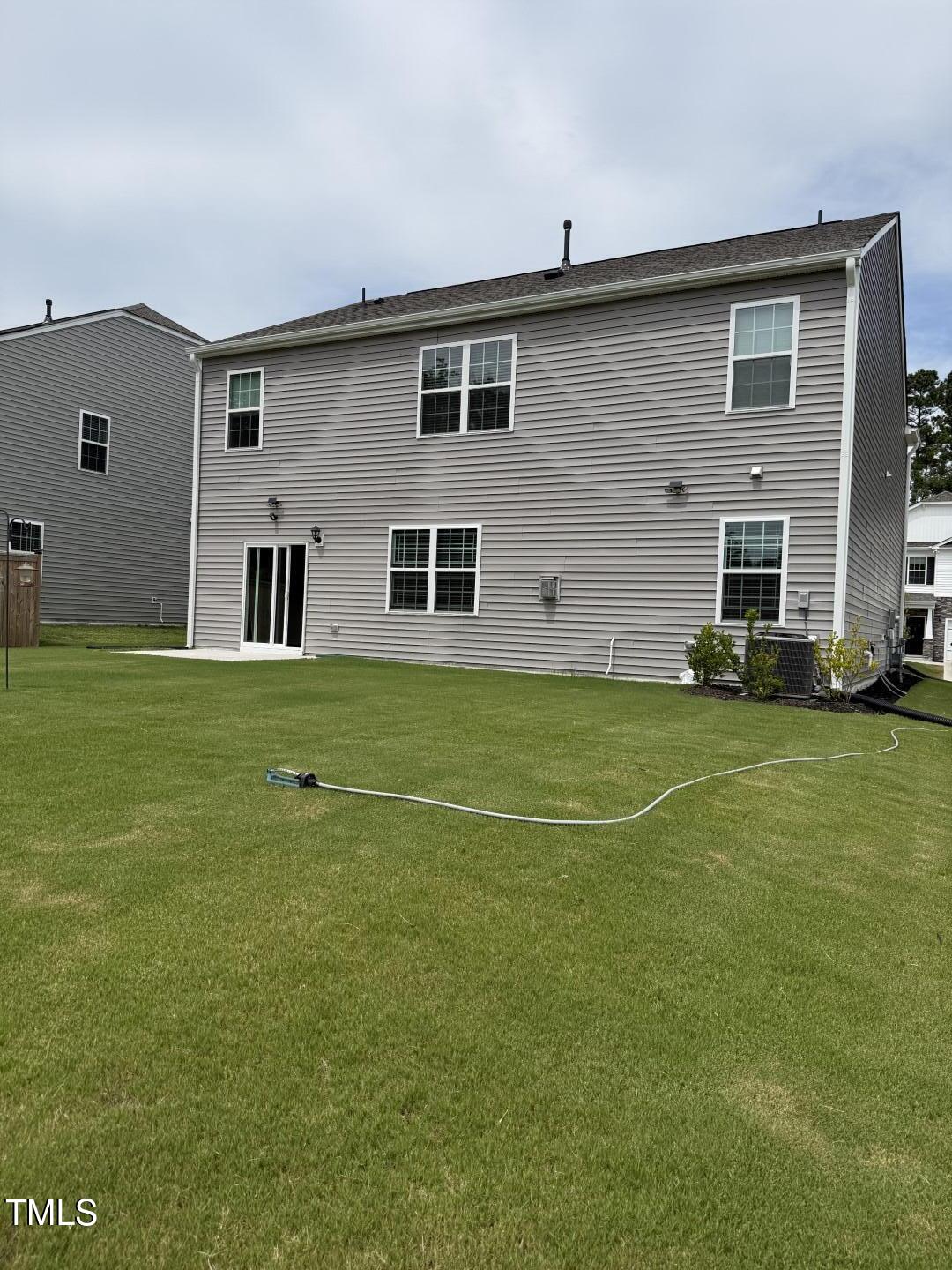 2018 Fletchers Ridge Drive Durham, NC 27703 - Photo 40 of 41 a view of a house with a backyard