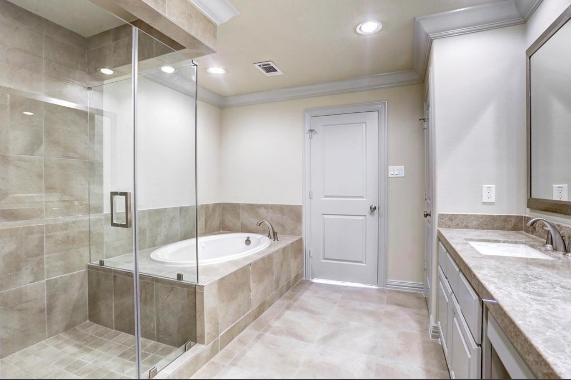 13621 Teal Bluff Lane Houston, TX 77077 - Photo 11 of 29 a bathroom with a tub sink shower and mirror