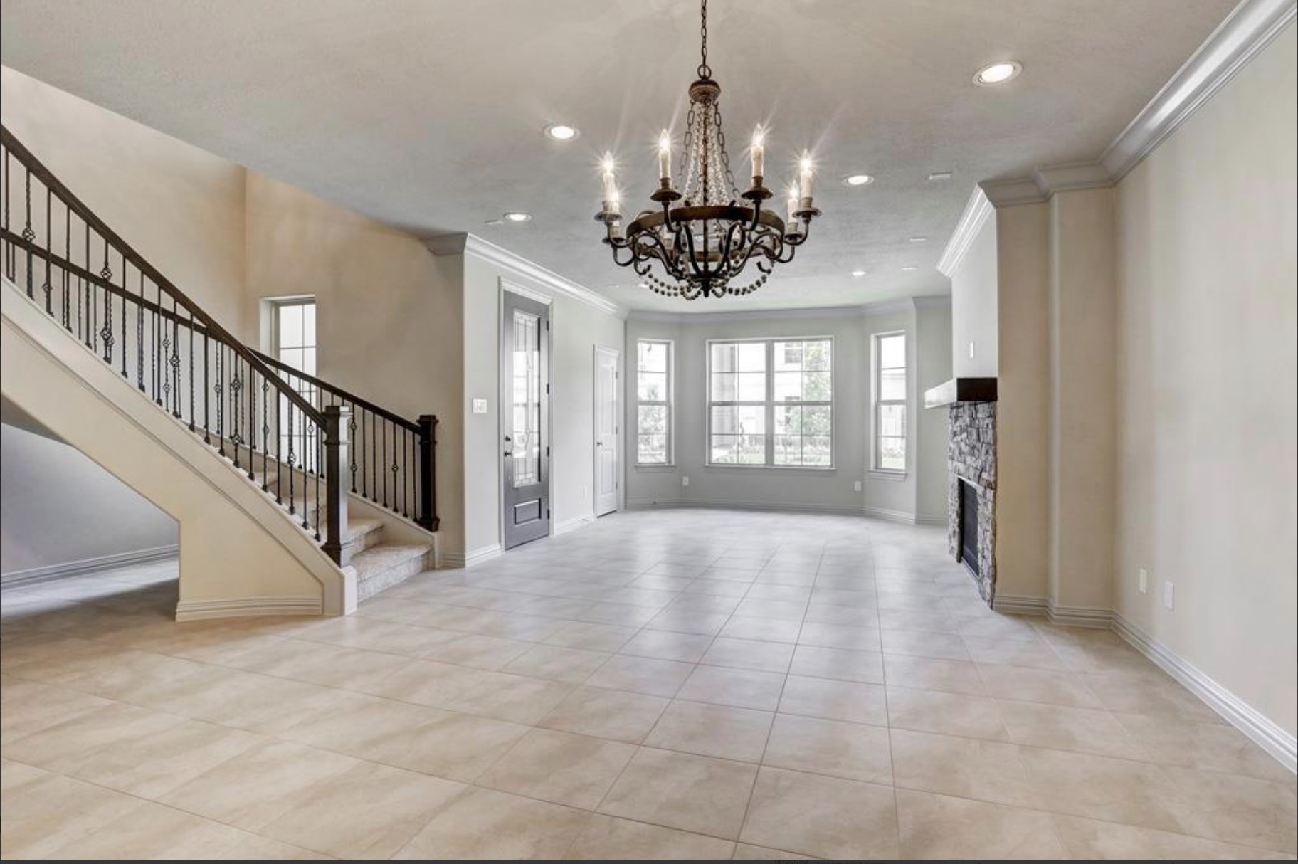 13621 Teal Bluff Lane Houston, TX 77077 - Photo 2 of 29 a view of an empty room with a window and fireplace
