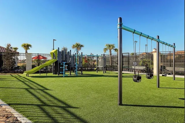 a view of a park with swings