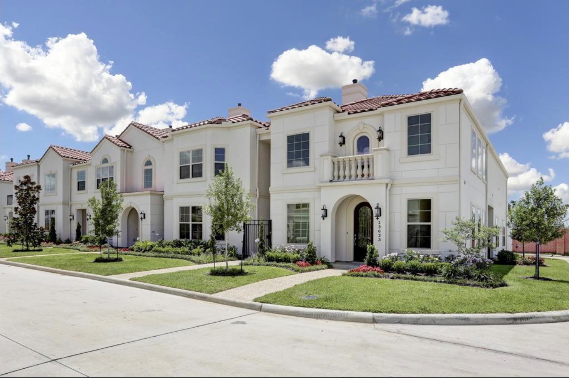 13621 Teal Bluff Lane Houston, TX 77077 - Photo 27 of 29 a front view of a house with a yard and garage