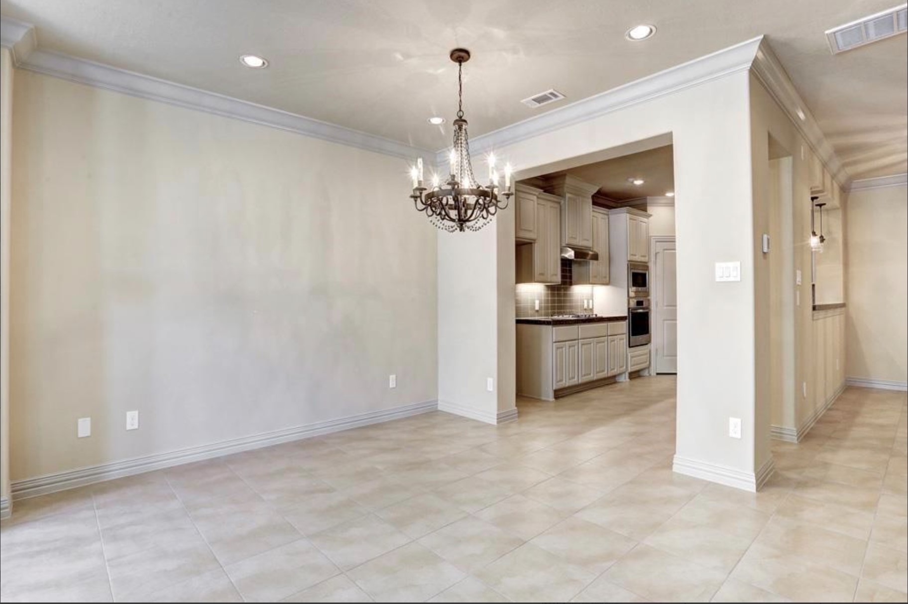 13621 Teal Bluff Lane Houston, TX 77077 - Photo 5 of 29 a view of a kitchen with a sink and refrigerator
