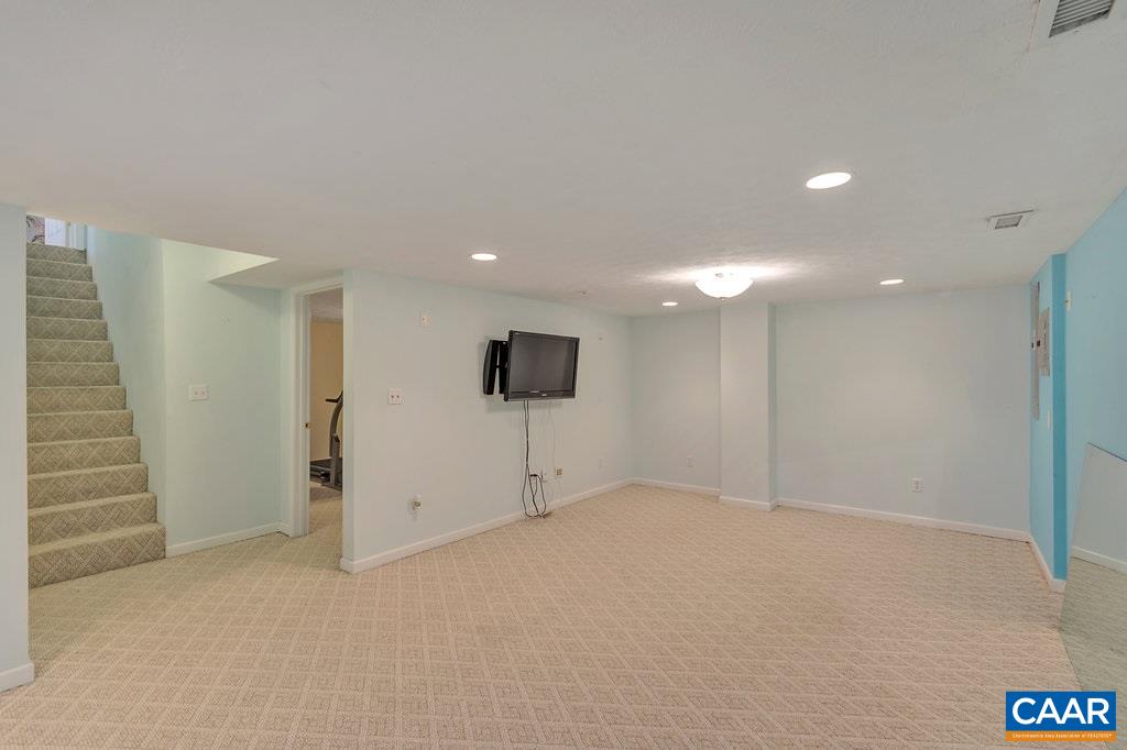 8424 Chestnut Grove Road Esmont, VA 22937 - Photo 23 of 42 an empty room with a windows and closet