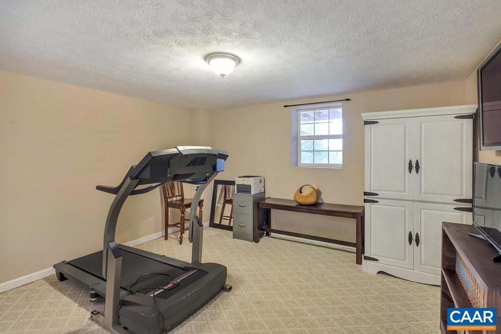 8424 Chestnut Grove Road Esmont, VA 22937 - Photo 26 of 42 a living room with furniture