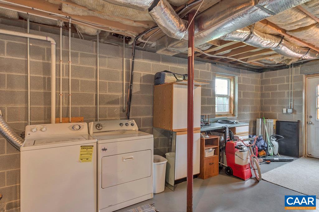 8424 Chestnut Grove Road Esmont, VA 22937 - Photo 27 of 42 a utility room with dryer and washer
