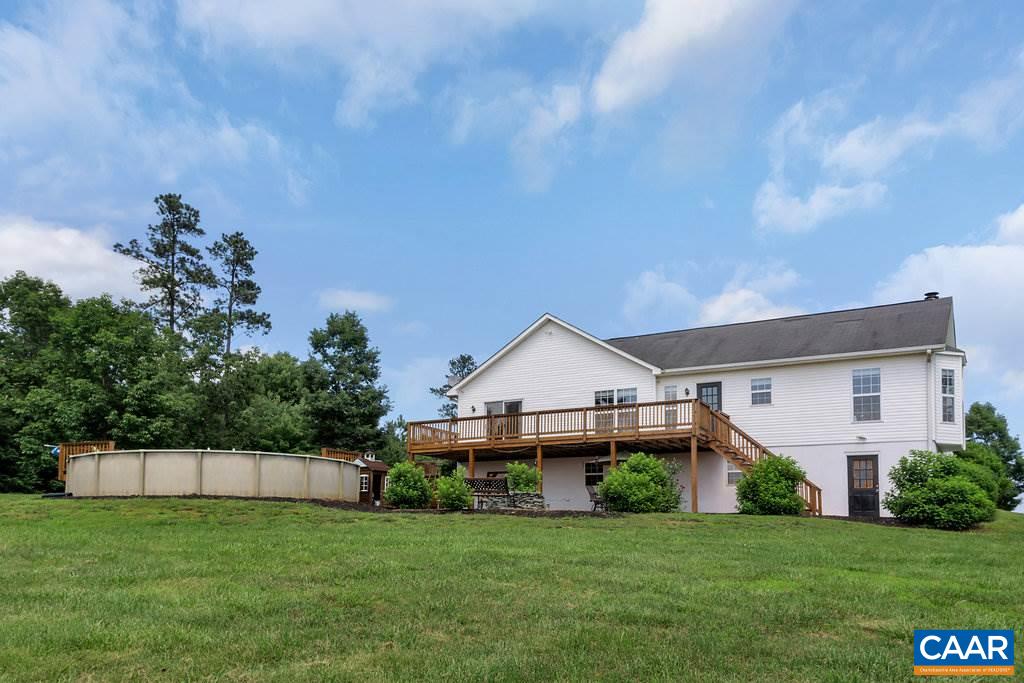 8424 Chestnut Grove Road Esmont, VA 22937 - Photo 33 of 42 a view of a house with a big yard