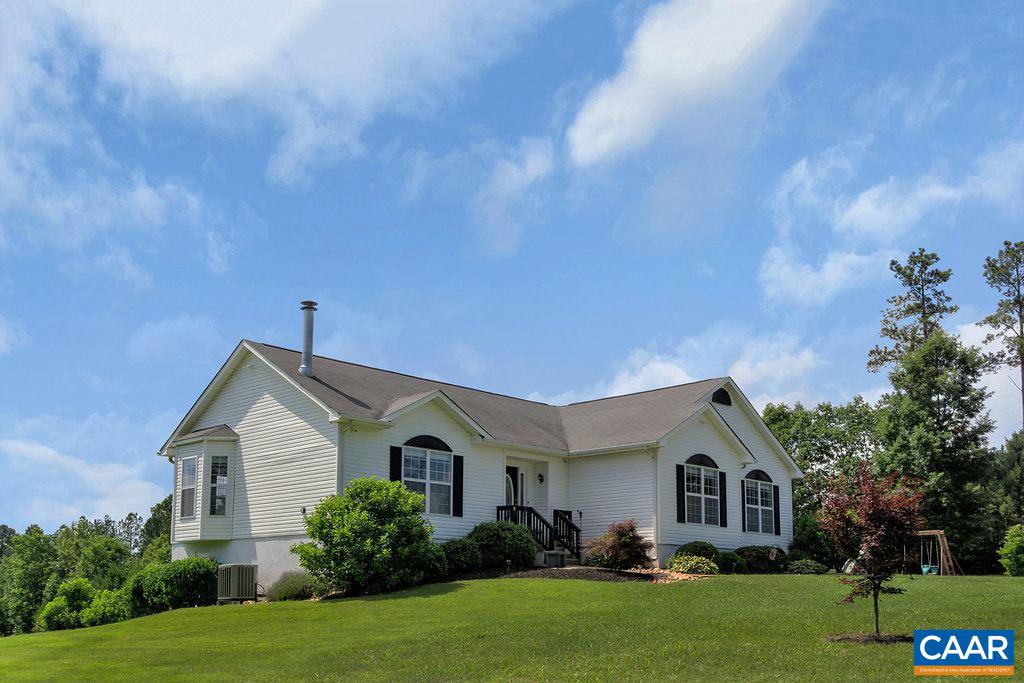 8424 Chestnut Grove Road Esmont, VA 22937 - Photo 37 of 42 a front view of a house with garden
