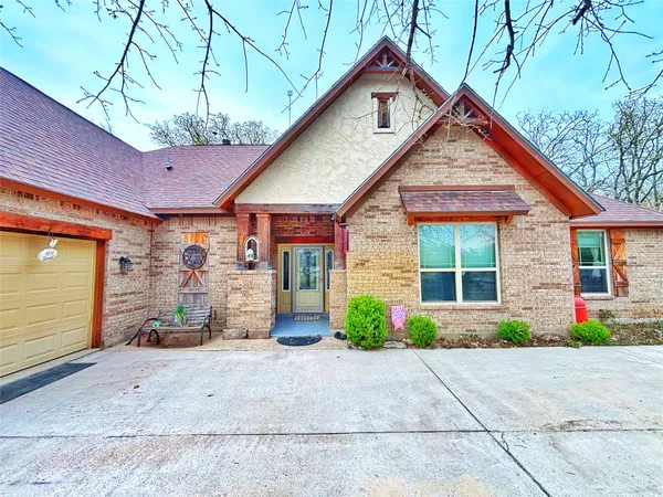 a view of a house with garage