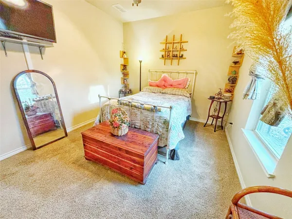 a living room with a couch and a table