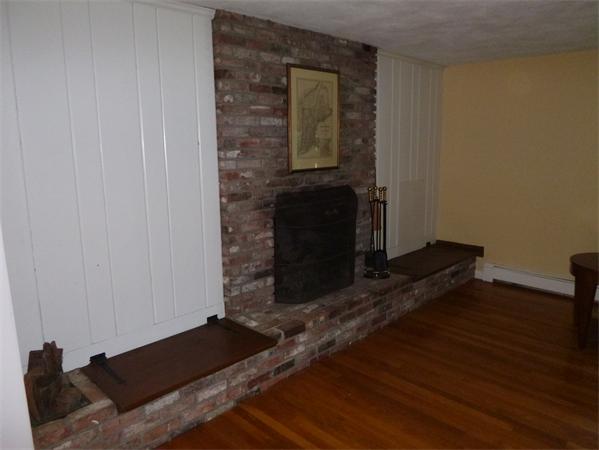 4 Olde Lantern Road Acton, MA 01720 - Photo 4 of 19 a living room with a fireplace