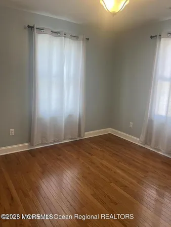 a bathroom with a toilet a sink and bathtub