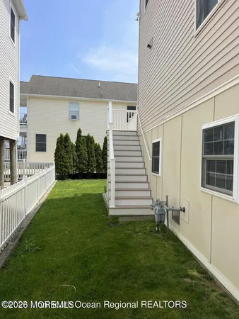 a view of a backyard with garden