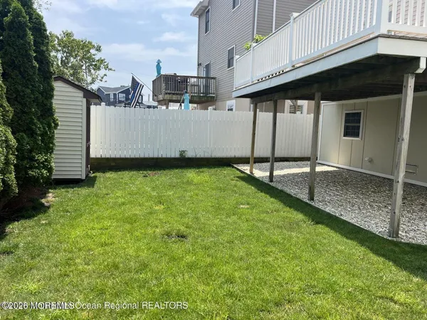a view of a porch with a yard