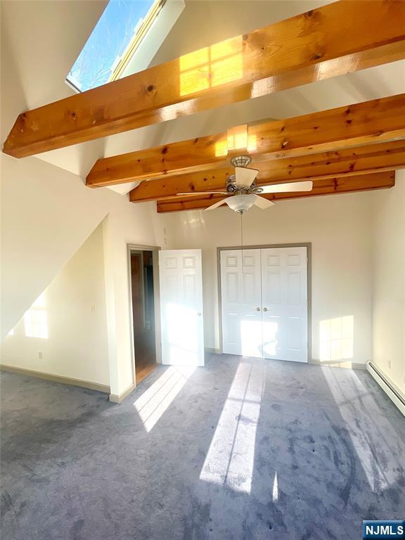 49 East Passaic Avenue, Unit 2 Rutherford, NJ 07070 - Photo 18 of 23 a view of a big room with windows and chandelier