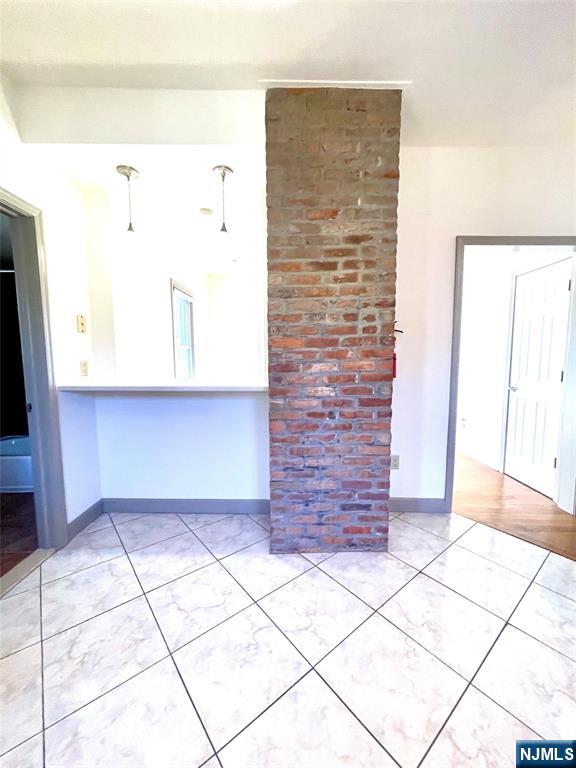 49 East Passaic Avenue, Unit 2 Rutherford, NJ 07070 - Photo 3 of 23 a view of a brick wall