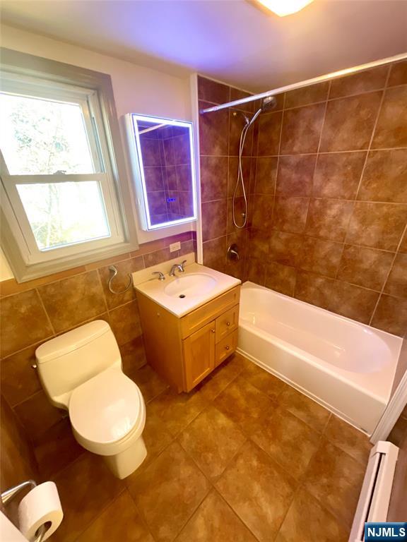 49 East Passaic Avenue, Unit 2 Rutherford, NJ 07070 - Photo 6 of 23 a bathroom with a sink and a bathtub