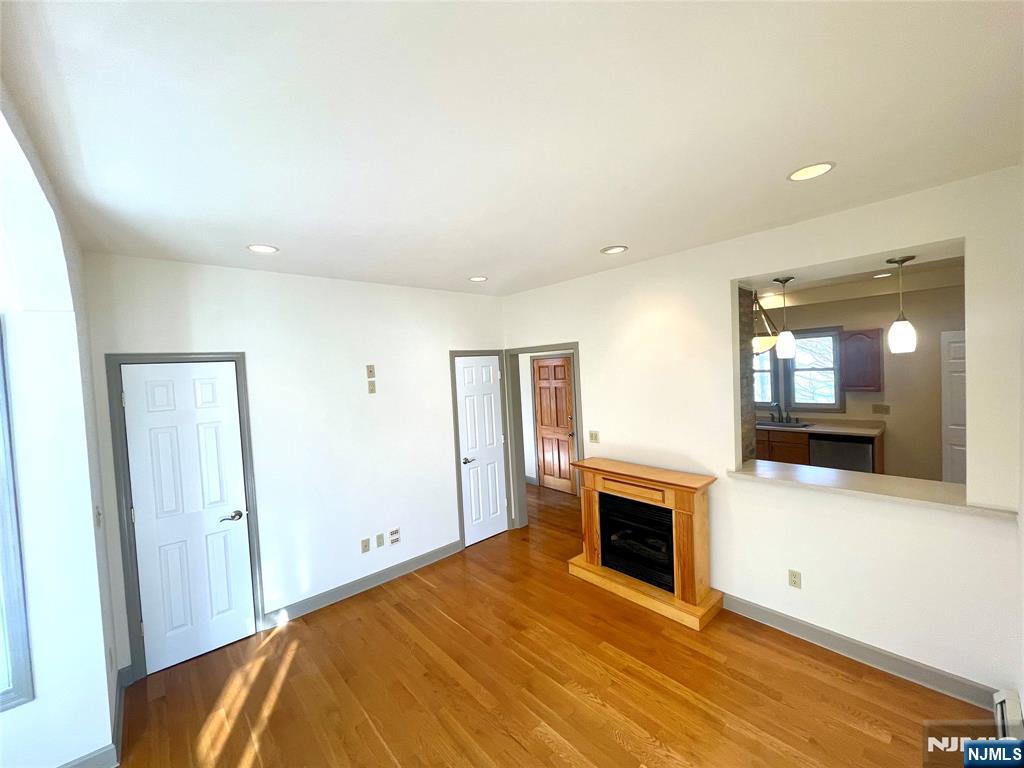 49 East Passaic Avenue, Unit 2 Rutherford, NJ 07070 - Photo 8 of 23 a view of a livingroom with a fireplace