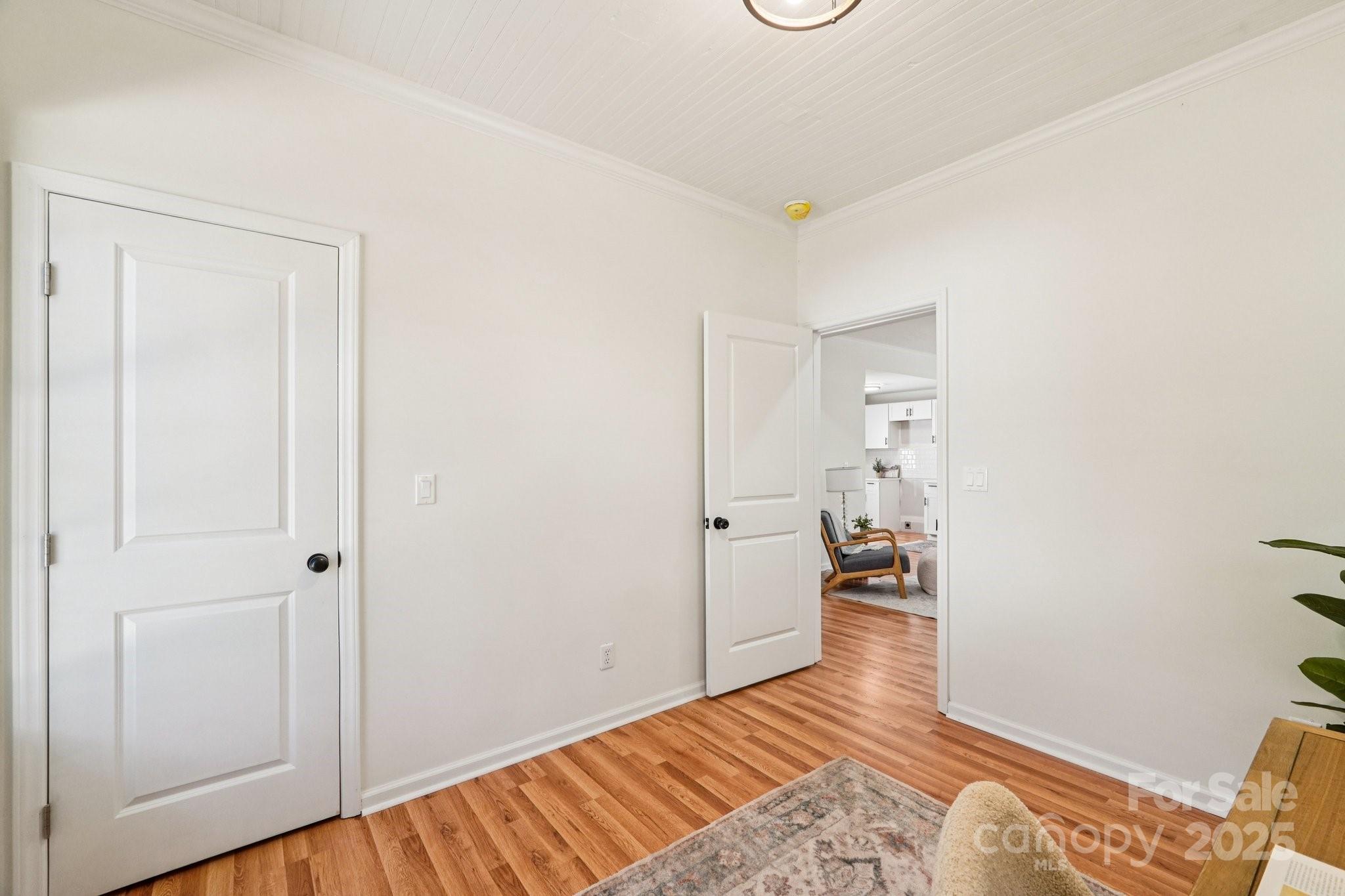38 6th Street York, SC 29745 - Photo 13 of 34 a bedroom with a bed and wooden floor