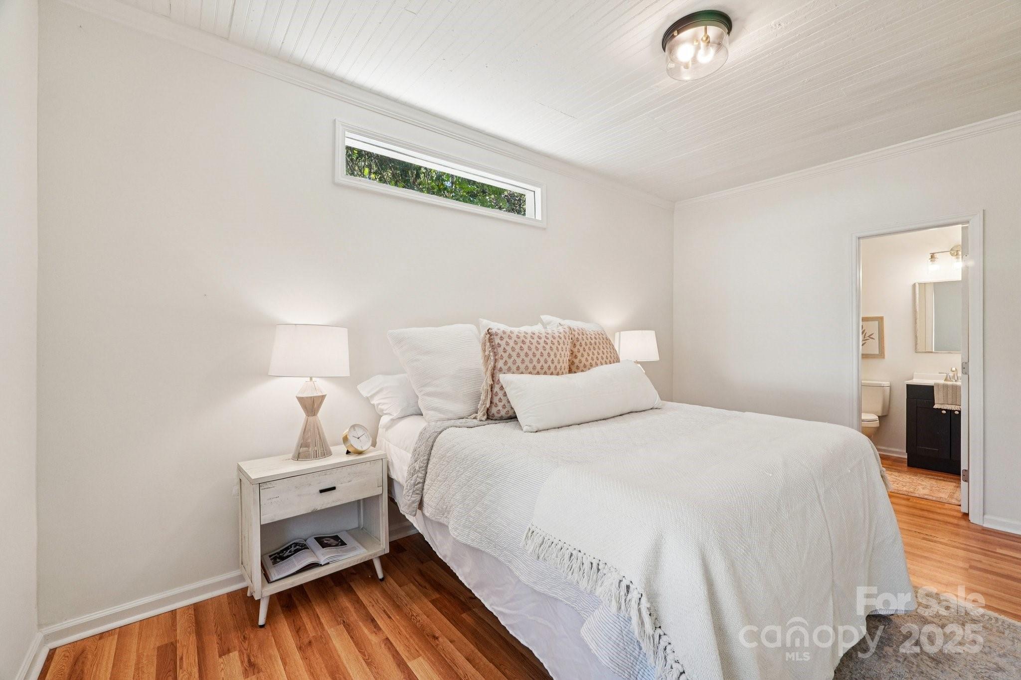 38 6th Street York, SC 29745 - Photo 18 of 34 a bedroom with bed and a window