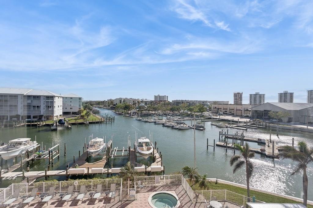 170 Lenell Road, Unit 403 Fort Myers Beach, FL 33931 - Photo 16 of 23 a view of a lake with tall buildings