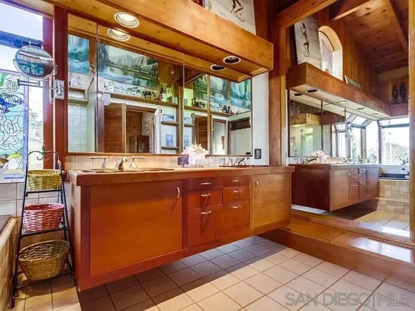 a bathroom with a bathtub and a sink