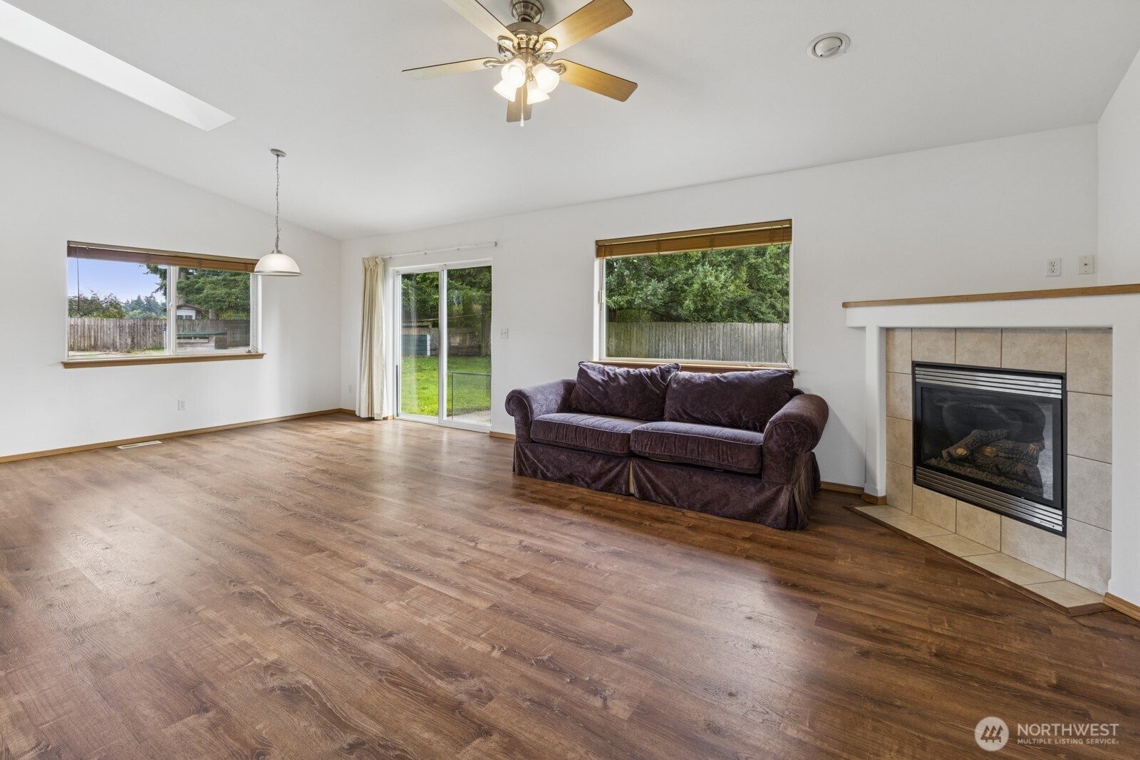 7245 185th Lane Southwest Rochester, WA 98579 - Photo 12 of 29 a living room with furniture and a fireplace
