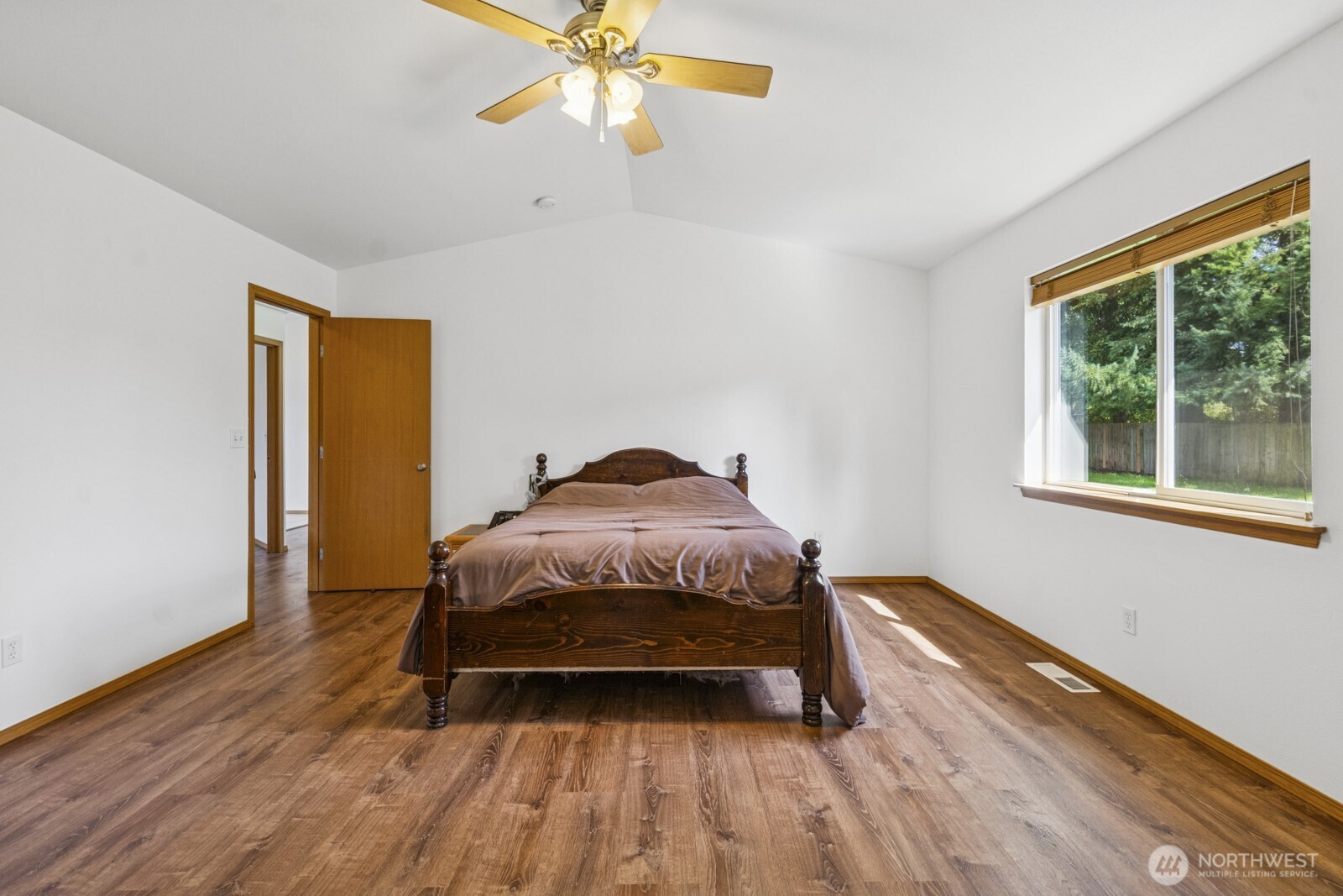 7245 185th Lane Southwest Rochester, WA 98579 - Photo 13 of 29 a bedroom with a bed and a window
