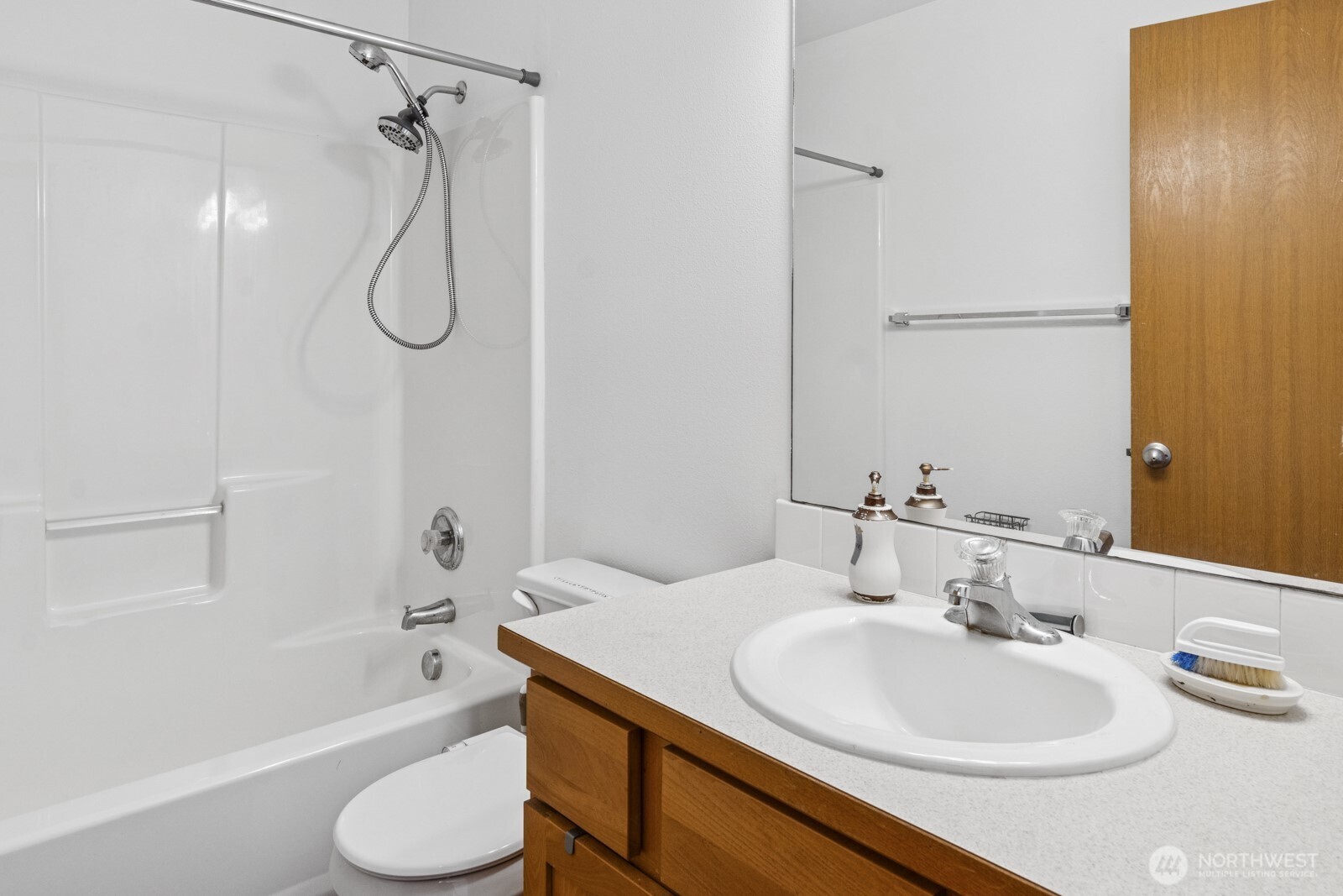 7245 185th Lane Southwest Rochester, WA 98579 - Photo 20 of 29 a bathroom with a sink a toilet and a bathtub