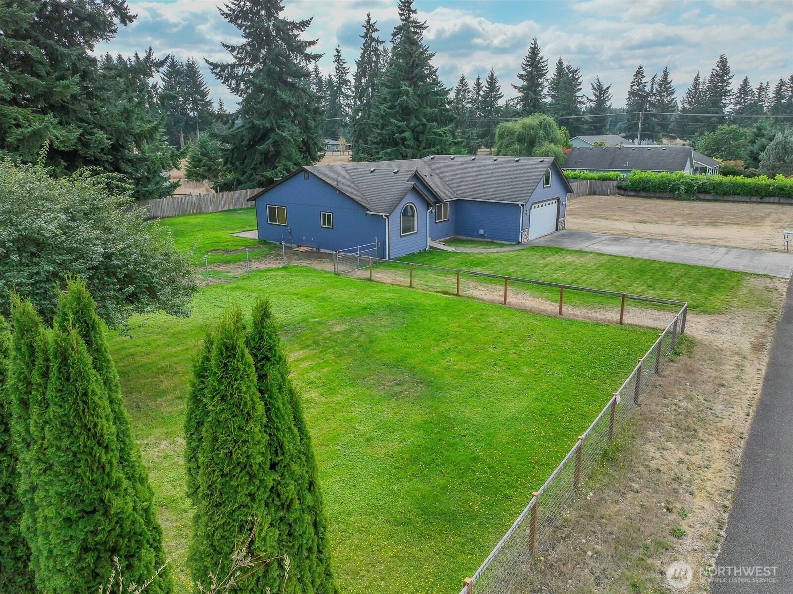 7245 185th Lane Southwest Rochester, WA 98579 - Photo 2 of 29 an aerial view of a house
