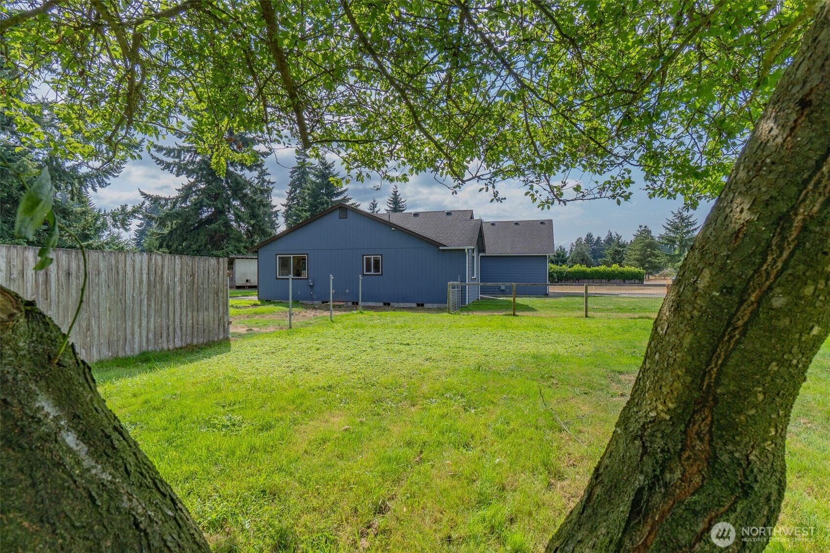 7245 185th Lane Southwest Rochester, WA 98579 - Photo 26 of 29 a house view with a garden space