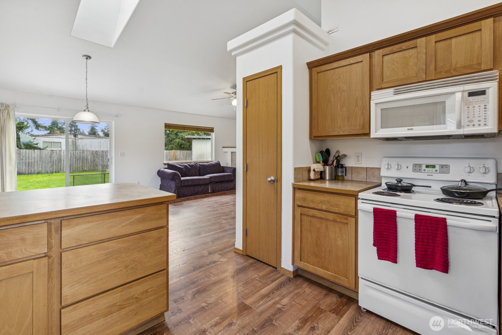 7245 185th Lane Southwest Rochester, WA 98579 - Photo 6 of 29 a kitchen with stainless steel appliances granite countertop a stove a sink and a refrigerator