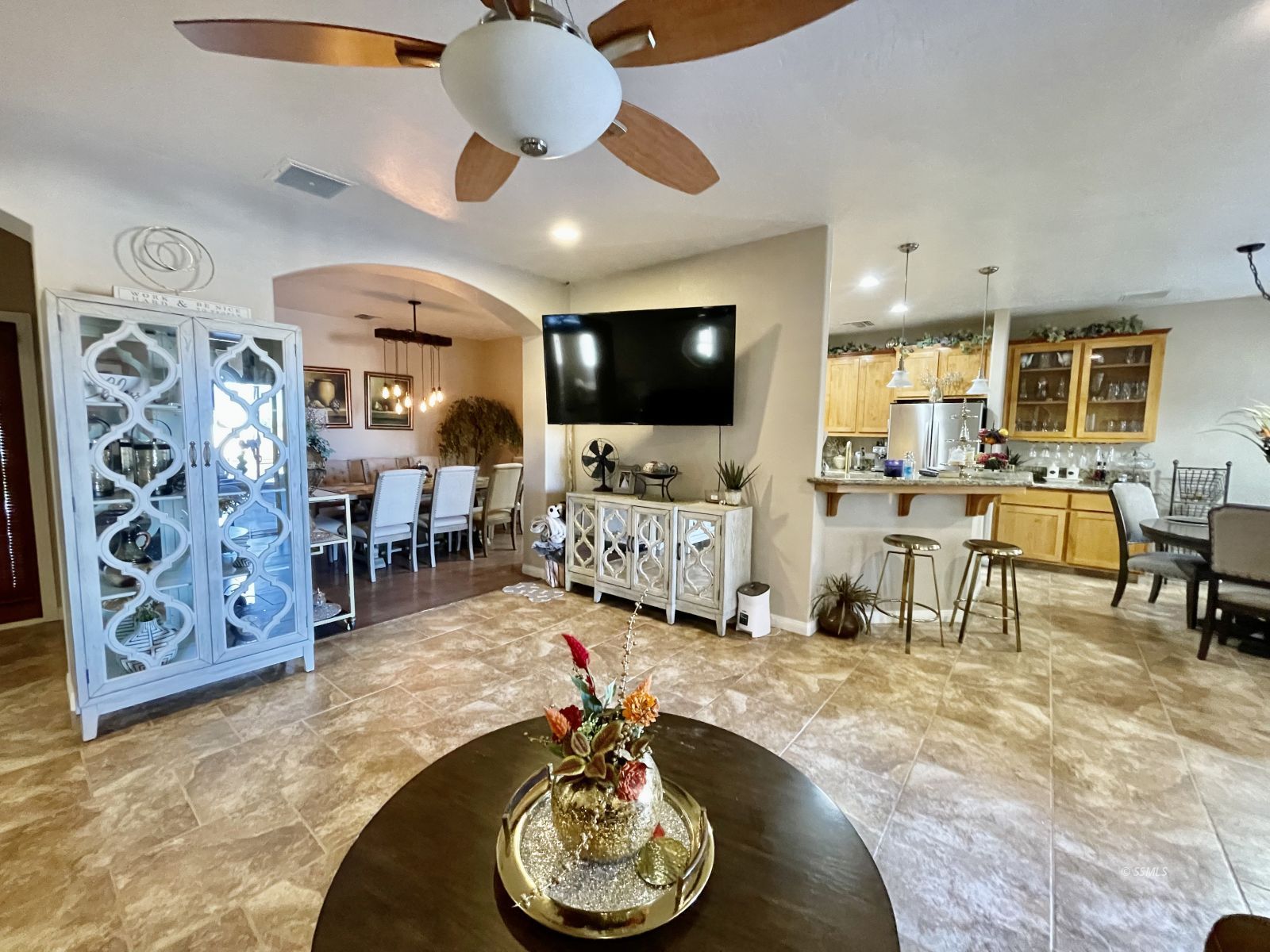 412 Acacia Street Ridgecrest, CA 93555 - Photo 16 of 31 a living room with furniture and a flat screen tv