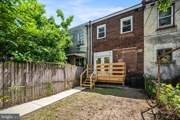 a view of a backyard with a garden