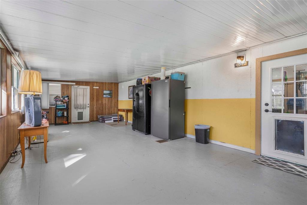 6716 West Riverbend Road Dunnellon, FL 34433 - Photo 37 of 75 a view of a room with furniture and a window