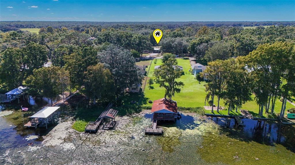6716 West Riverbend Road Dunnellon, FL 34433 - Photo 65 of 75 a view of a bench in a backyard