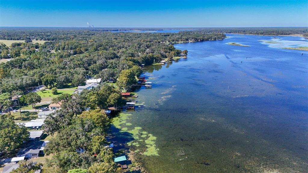 6716 West Riverbend Road Dunnellon, FL 34433 - Photo 66 of 75 an aerial view of a houses with a yard