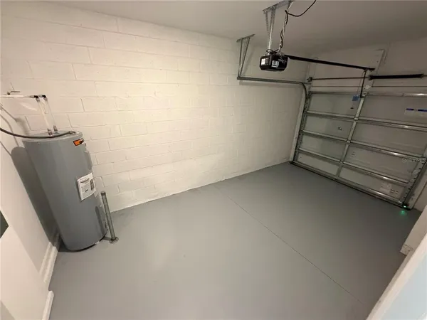 a view of storage and utility room with racks on the wall