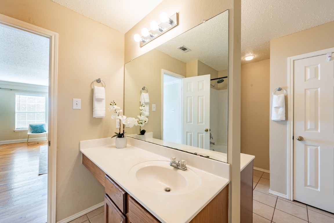 2017 Carriage Club Drive Cedar Park, TX 78613 - Photo 27 of 35 a bathroom with a sink and a mirror