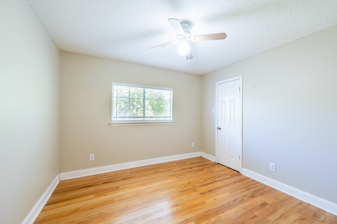 2017 Carriage Club Drive Cedar Park, TX 78613 - Photo 30 of 35 a view of an empty room with wooden floor