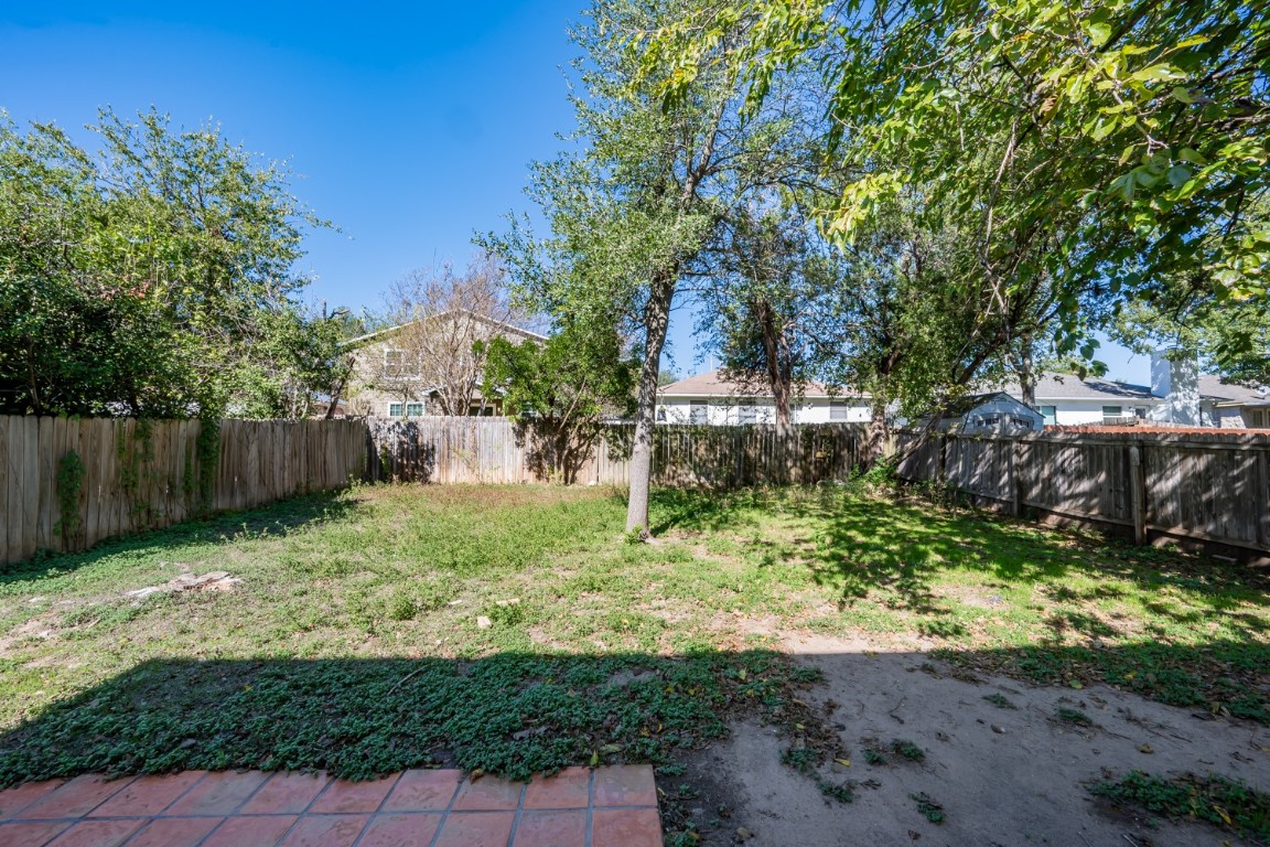 2017 Carriage Club Drive Cedar Park, TX 78613 - Photo 35 of 35 a backyard of a house with lots of green space