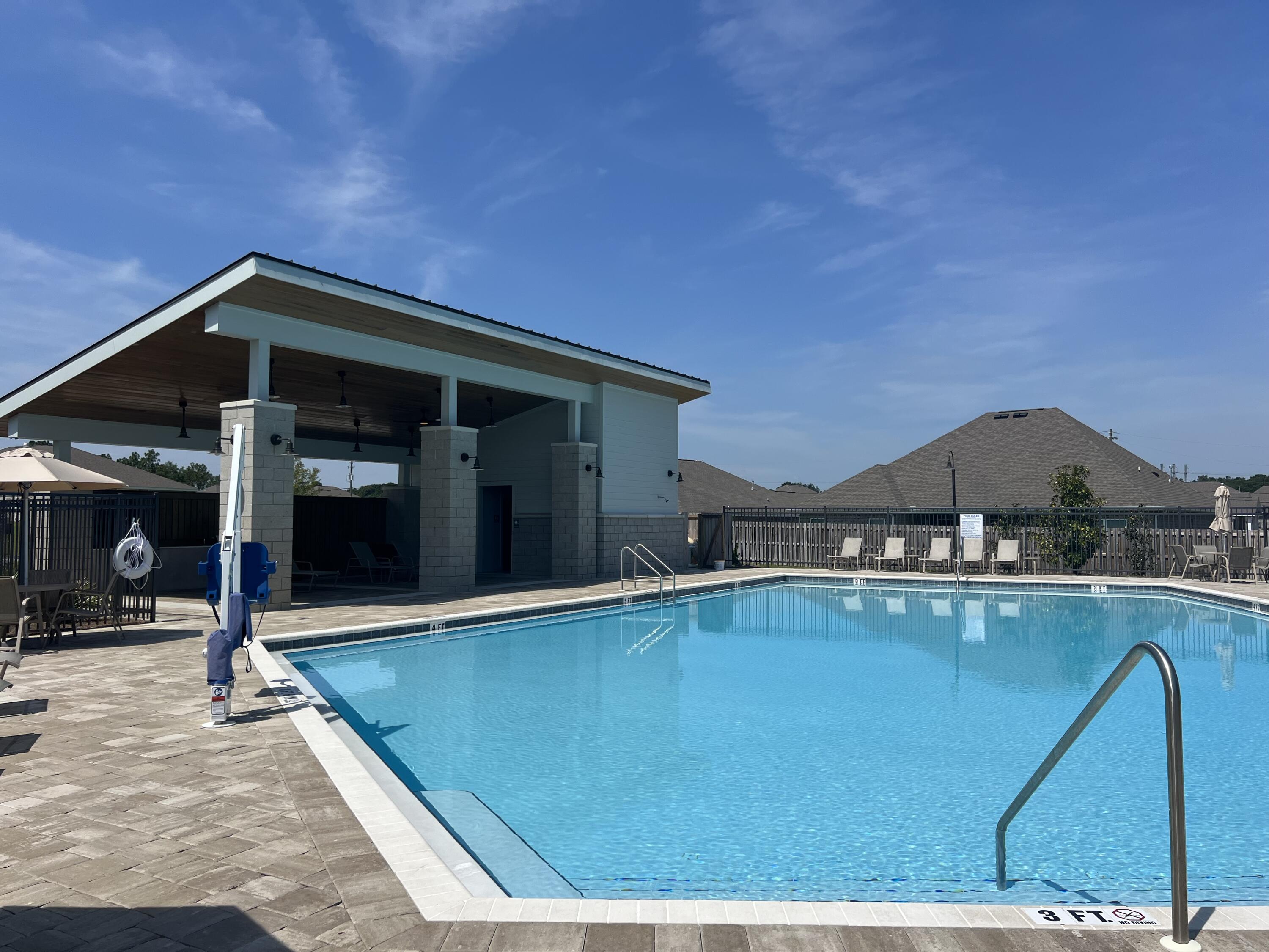 4735 Airmen Drive Crestview, FL 32539 - Photo 41 of 42 a view of a house with a swimming pool