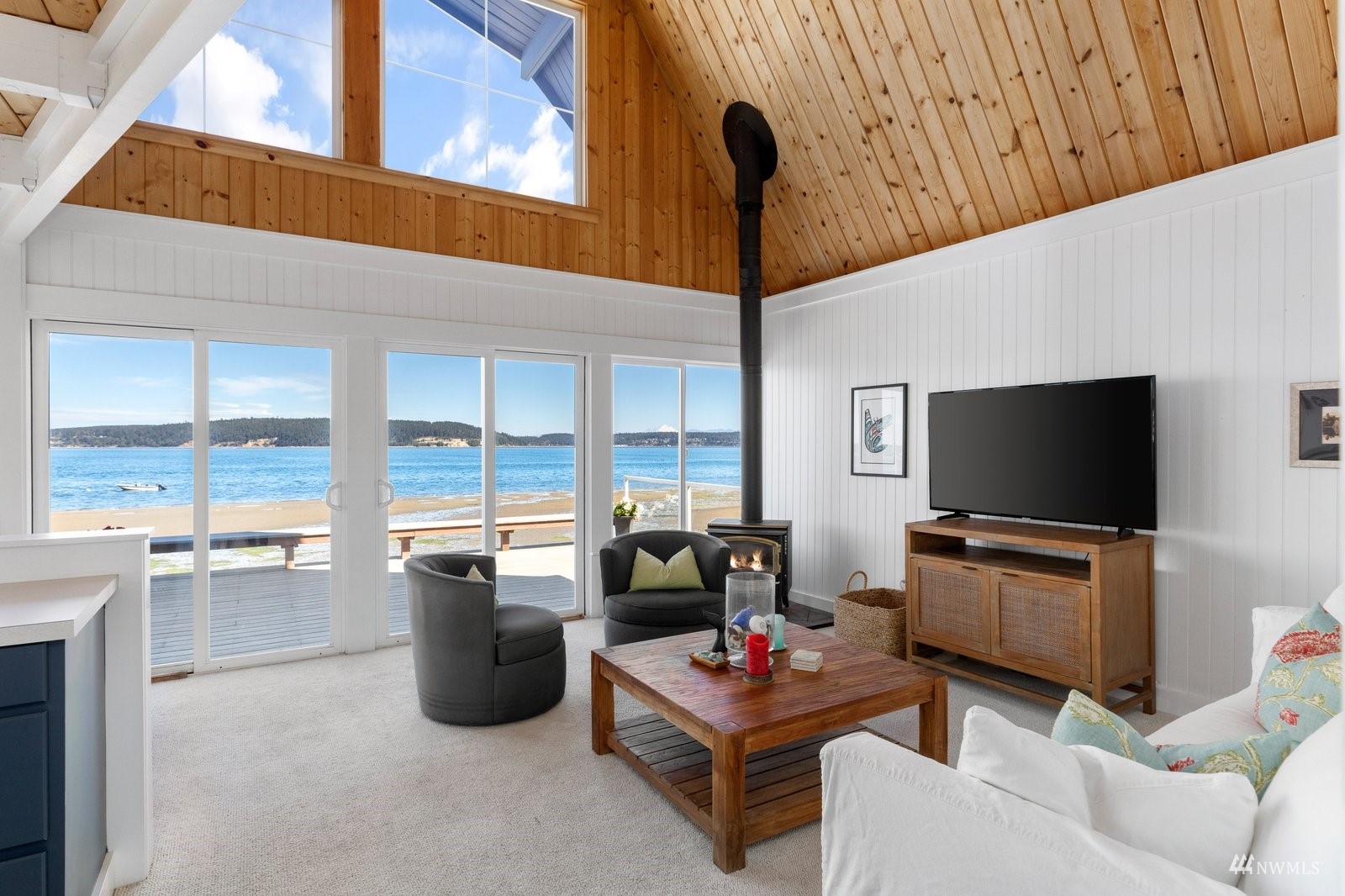 2139 Eastpoint Drive Langley, WA 98260 - Photo 13 of 40 a living room with furniture and a flat screen tv