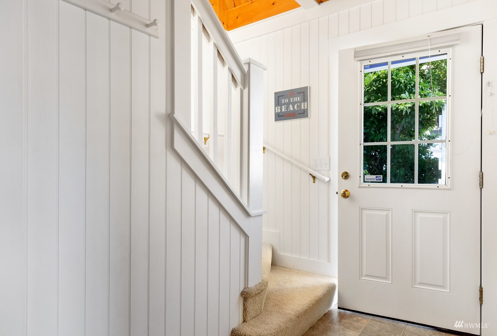 2139 Eastpoint Drive Langley, WA 98260 - Photo 20 of 40 a view of entryway with wooden floor and stairs