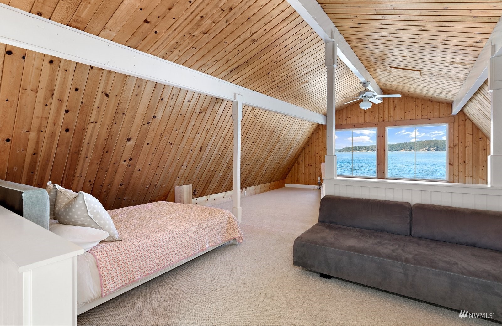 2139 Eastpoint Drive Langley, WA 98260 - Photo 24 of 40 a bedroom with furniture and a window