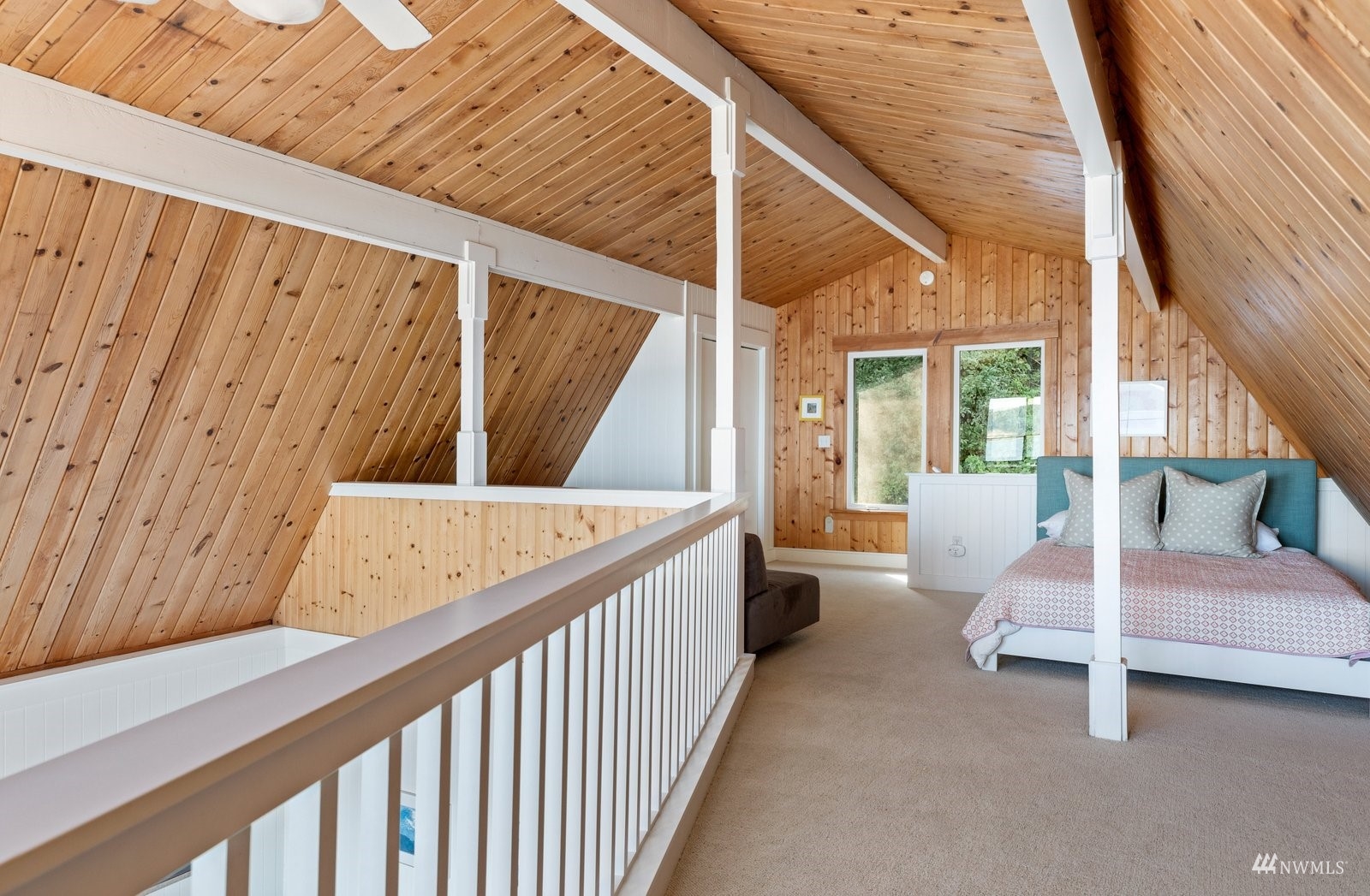 2139 Eastpoint Drive Langley, WA 98260 - Photo 27 of 40 a view of room with wooden floor and chair
