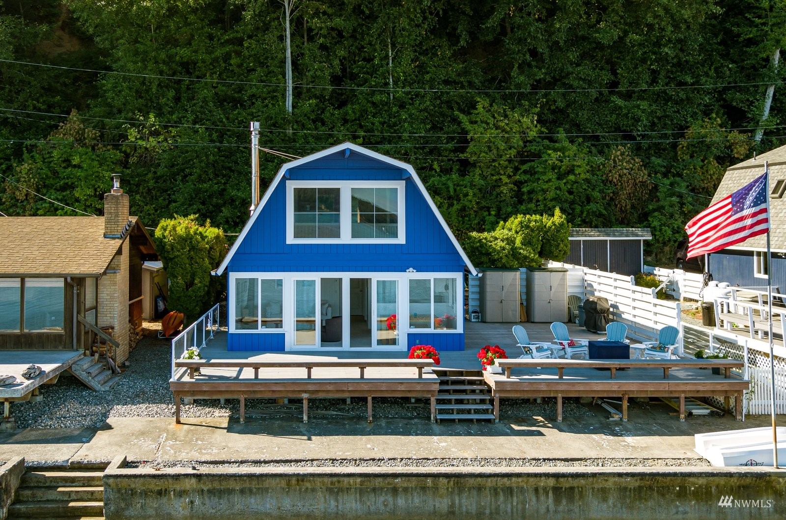 2139 Eastpoint Drive Langley, WA 98260 - Photo 30 of 40 a view of house with swimming pool and outdoor seating