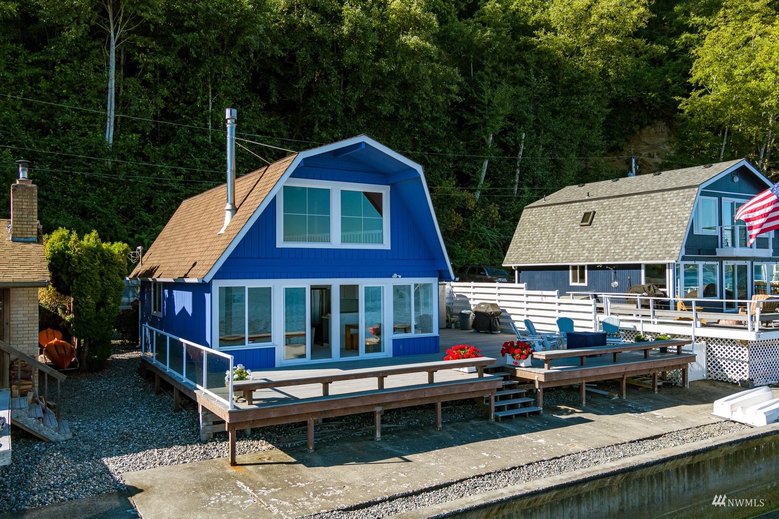 2139 Eastpoint Drive Langley, WA 98260 - Photo 35 of 40 a aerial view of a house with swimming pool and porch