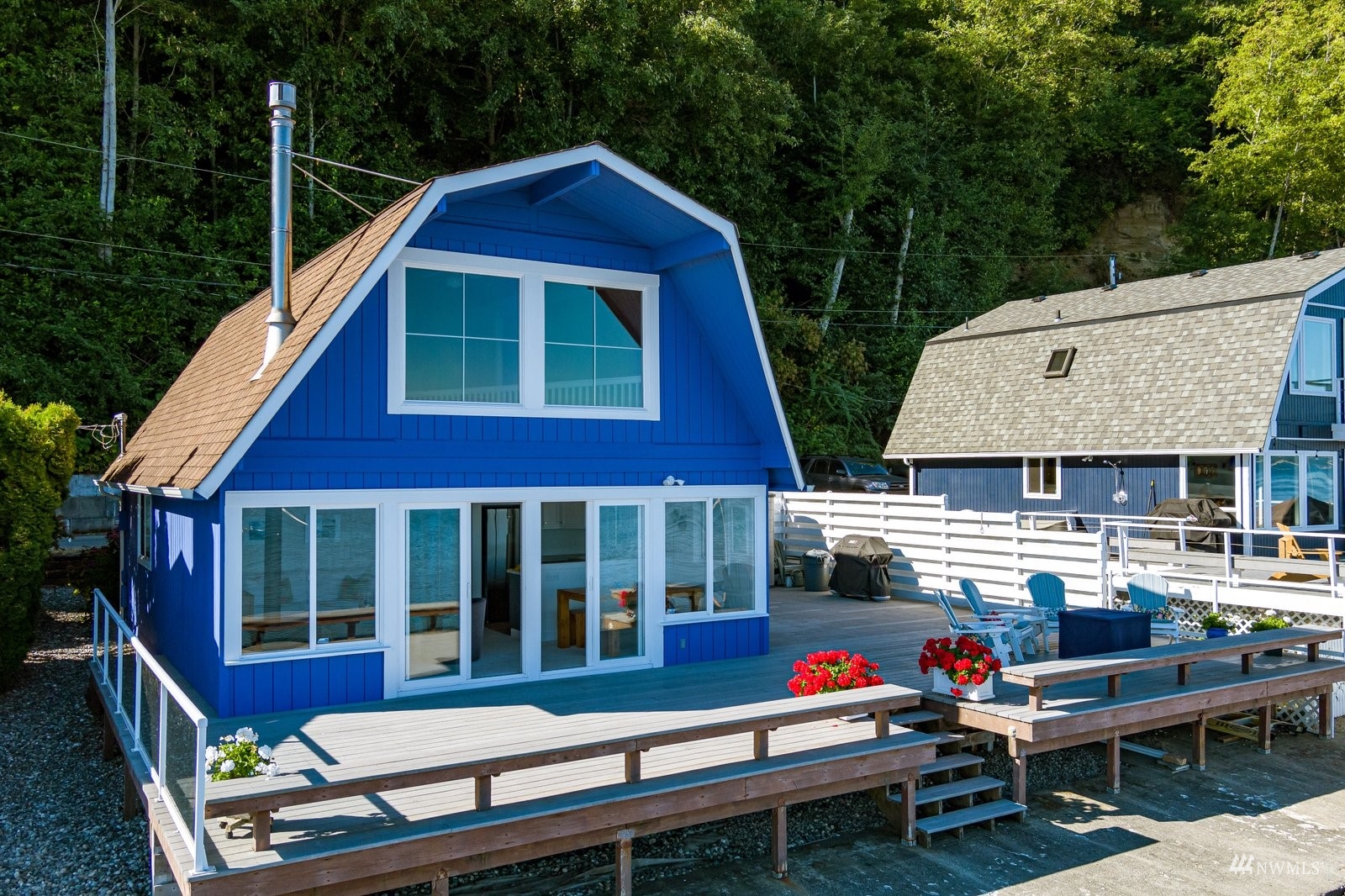 2139 Eastpoint Drive Langley, WA 98260 - Photo 36 of 40 a backyard of a house with outdoor seating