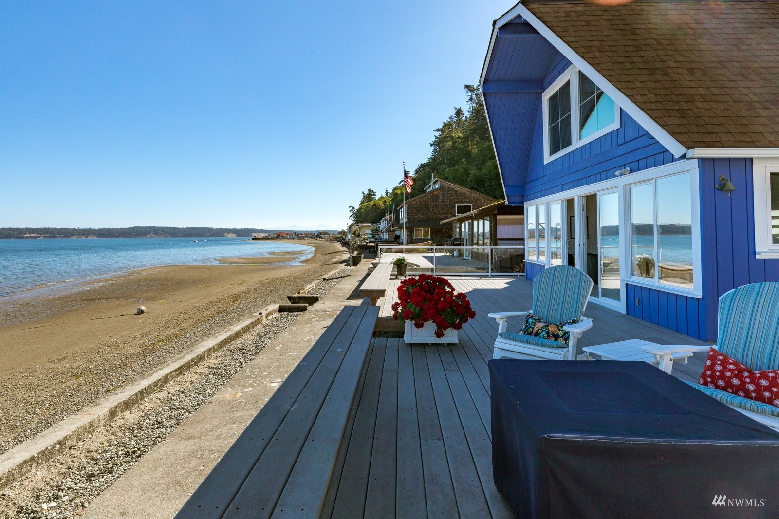 2139 Eastpoint Drive Langley, WA 98260 - Photo 7 of 40 a view of a balcony with chair and wooden floor
