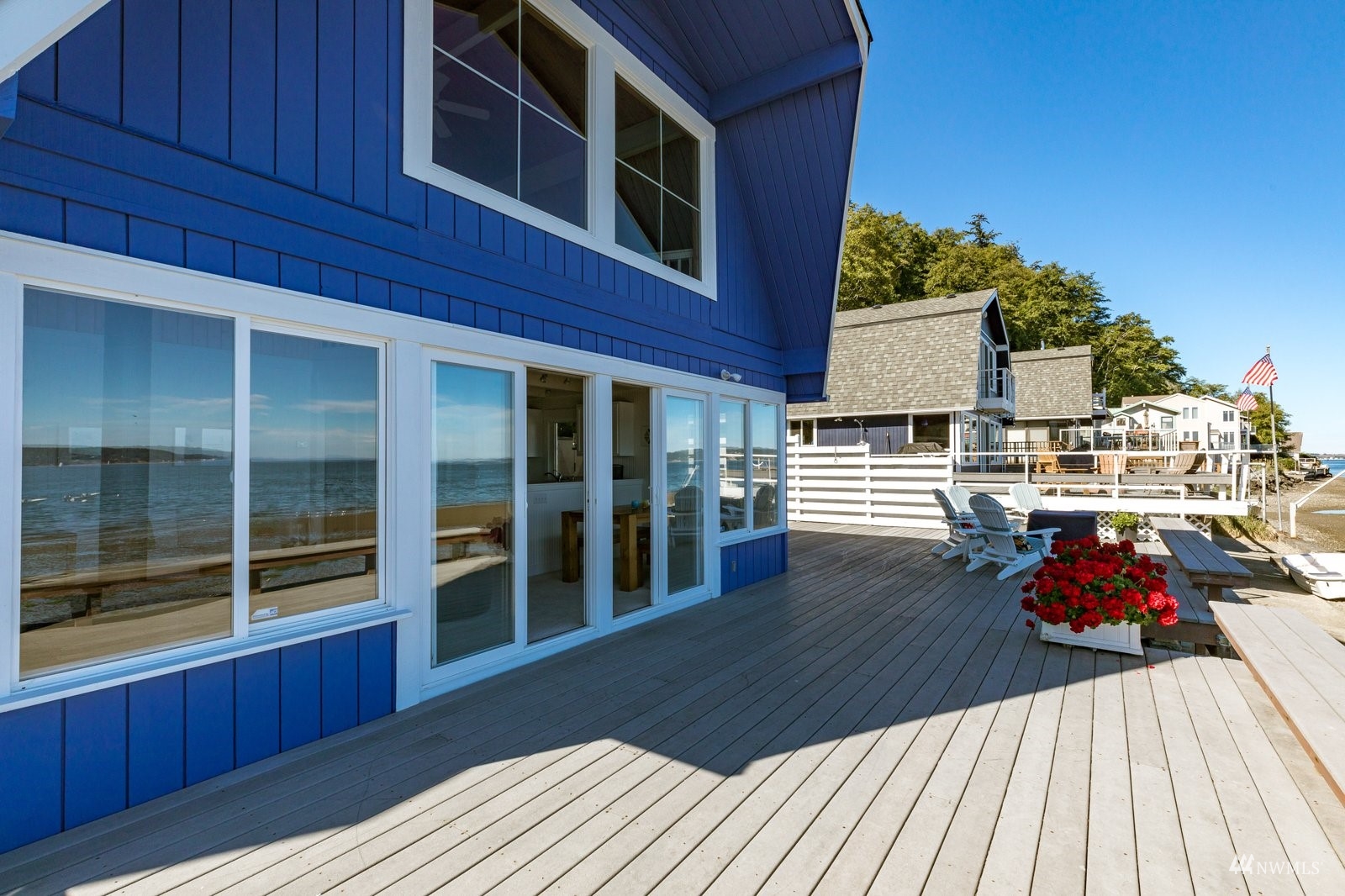 2139 Eastpoint Drive Langley, WA 98260 - Photo 8 of 40 a view of a deck with wooden floor and fence
